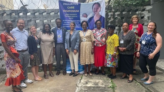 A group standing outside at the Palliative Care Symposium