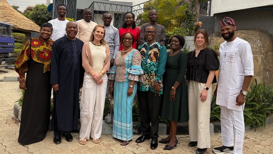 H2Net collaborators standing together at a site visit in Nigeria
