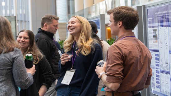 Poster presenters and attendees at the Pathogen Genomics Symposium